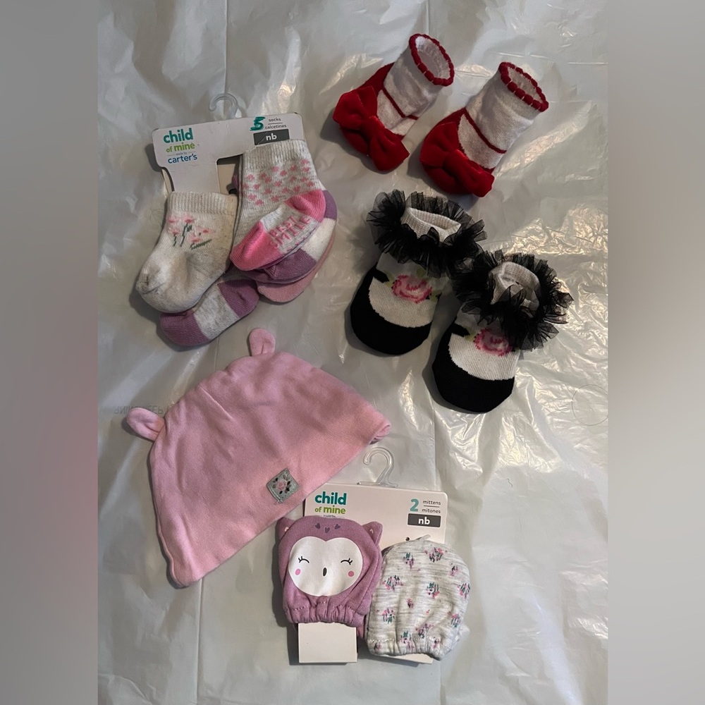 Newborn Baby Girl Bundle:2 mittens new, 1 cap new, 5 pair of socks 5 new, 2 used